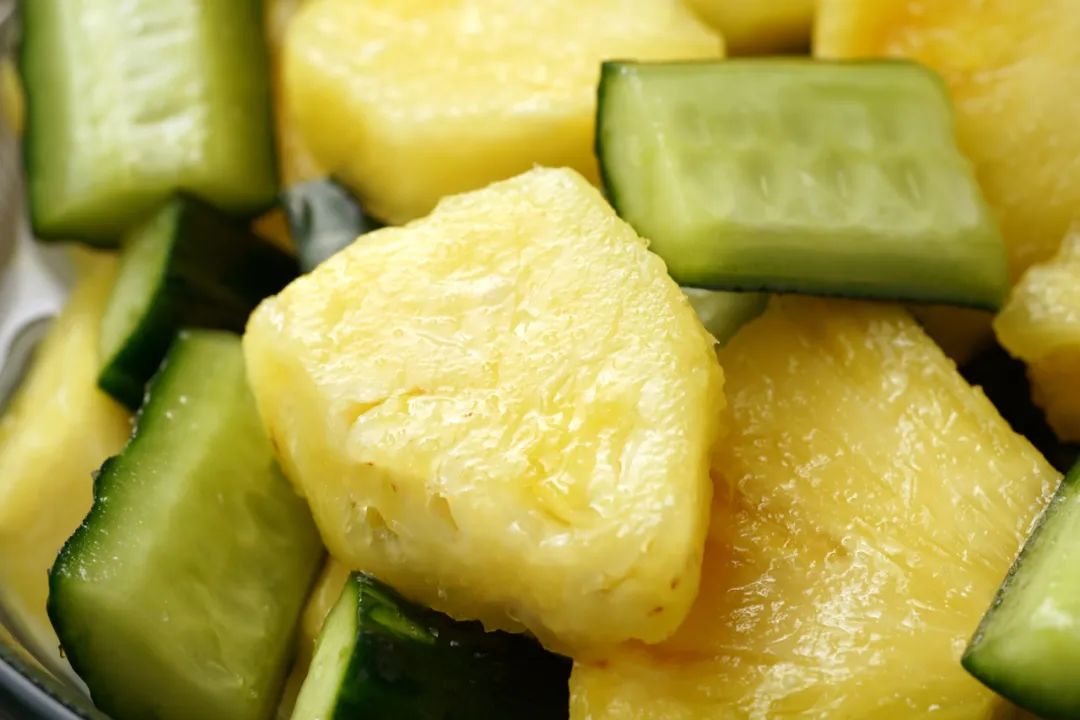 Pickled fruits and vegetables served in a bowl