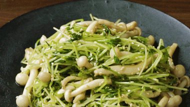 Adding pea shoots to boiling water
