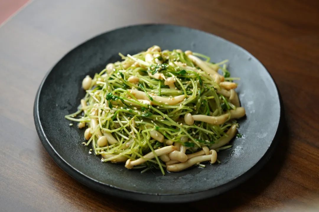 West Lake Longjing tea leaves in traditional packaging